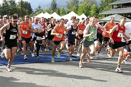 Elite runners lead the pack at the start of the Railroad Days Run. Mark Carrell of Selah