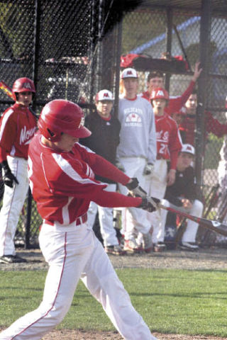 Wildcat Dustin Breshears connects with a pitch from Sammamish during play Friday