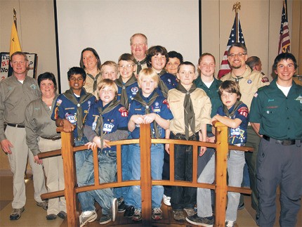 Members of Cub Scout Pack 465 graduate to become Boy Scouts in a March 12 ceremony. New Boy Scout Troop 115 will serve Snoqualmie Ridge’s growing number of boys.