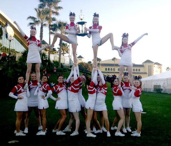 Mount Si cheerleaders hold their trophy won at nationals in Florida. Tryout clinics for next year’s team begin in May.