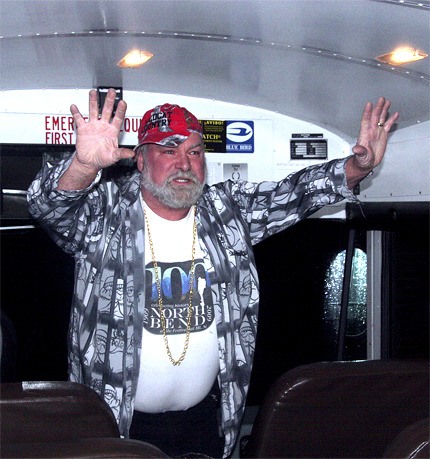 Bus driver Chuck Smith raps his way through the emergency drill during his morning bus ride. Smith’s rhyming delivery helps break through the monotony of the standard safety spiels.