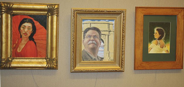 Portraits and paintings (self-portrait in the middle) by Michael McDevitt