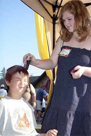 Children get a whole new do at the Kids’ Area during the North Bend Block Party. A full slate of activities are planned when the party returns Saturday