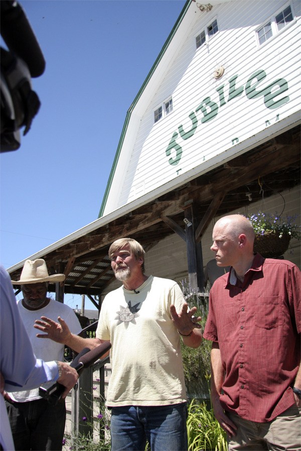 Explaining the Snoqualmie Valley Preservation Association's lawsuit against the U.S. Army Corps of Engineers to reporters