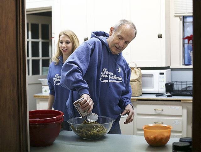 YMCA volunteers Rullie Harris and Cassie Craig prepare a community dinner at Snoqualmie United Methodist Church