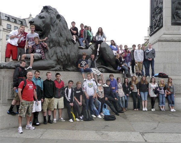 Members of the Mount Si High School boys and girls soccer teams mingle with students from host school Bishop Heber High School at Trafalgar Square in London. Wildcat players spent 10 days in England this summer as part of an athletic and cultural exchange.