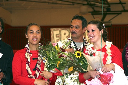 Robyn Schirmer and Shelagh Macaulay listen as teammates