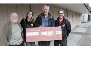 Gathering at the site of a future downtown North Bend mural