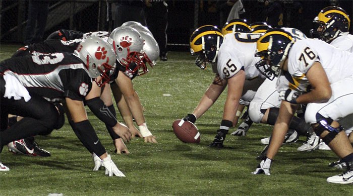 Mount Si linemen face off against a Bellevue offense in the second quarter of the Wildcat homecoming game