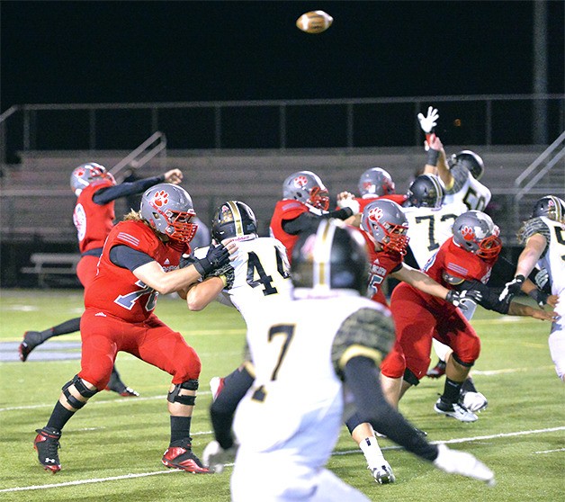 The Mount Si offensive line gives JoJo Hillel time to fire a pass. The quarterback had four touchdown passes on the night last Friday to cap the season.