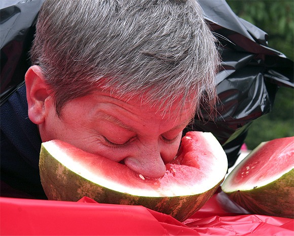 Doug Johnson of Snoqualmie gets messy in the annual watermelon eating contest. Eating mayhem returns at 1:30 p.m. Saturday in Quigley Park.