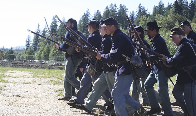 Men and women soldiers with the 20th Maine