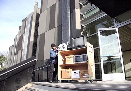 Pushing a cartload of city property up the entrance ramp