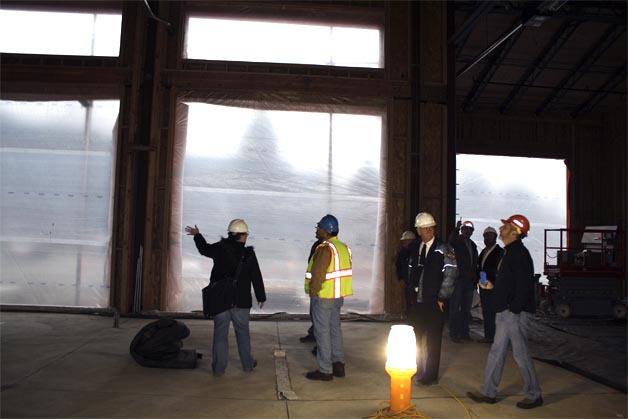 Architect Michelle Langrehr of TCA leads a group of City of North Bend and Eastside Fire and Rescue employees through the new Fire Station 87