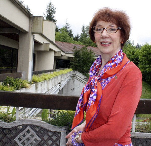 Carol Waters overlooks Snoqualmie Valley Hospital. A former company president who broke the glass ceiling