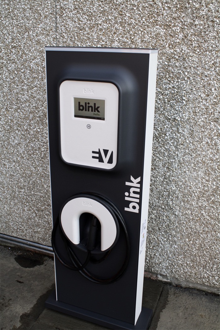 Three Blink electric car charging stations