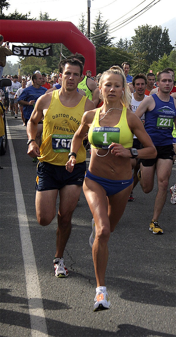 Railroad Days men’s 5K winner Jesse Stevick and 10K women’s winner Claudia Copeland start their races.