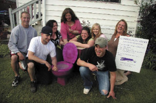 Sharing a laugh about their “Potty Passer” fundraiser — a purple toilet eyesore dropped surreptitiously at unsuspecting homes —  members of the Angels of Hope Relay for Life Team include