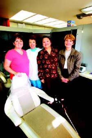 Dentist returns home to North Bend