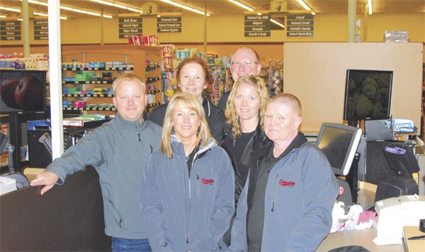 Staff and owners of the new Carnation Market pictured from left are: front