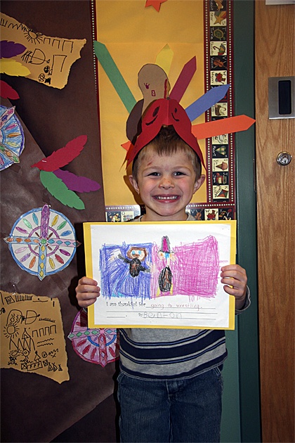 Displaying artwork depicting his thankfulness for a recent trip to a wrestling match