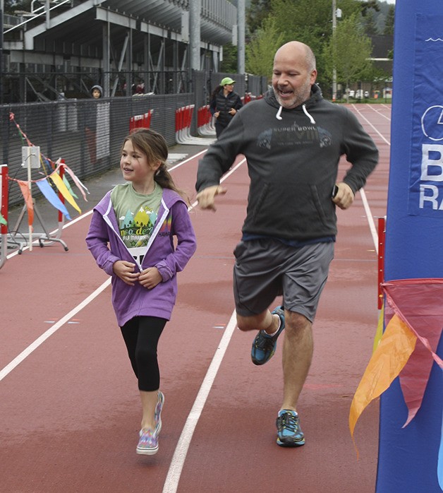 David and Megan Algrim of Snoqualmie finish the children’s one-mile race at the Cinco de Mayo fun run