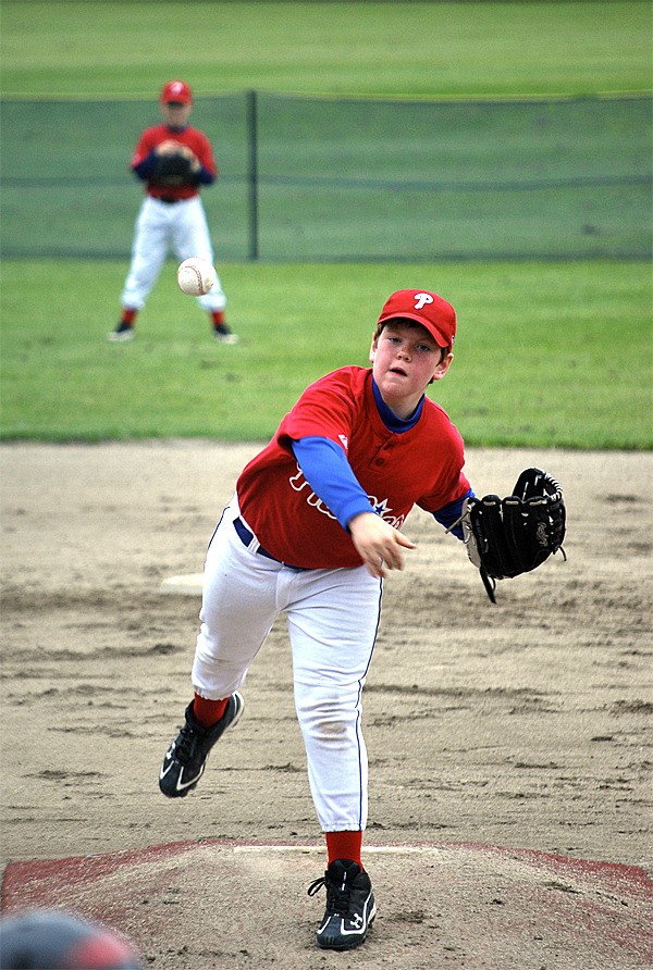 Dustin Dover of the Snoqualmie Valley Little League Phillies team throws a pitch Saturday