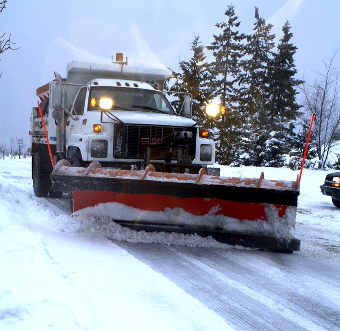 Snowplow driver Todd Shinn makes a pass on Eagle Lake Drive Wednesday