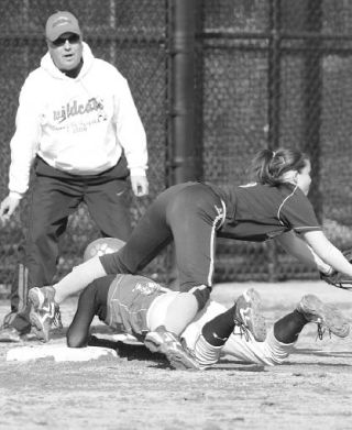 Kyleen Sweepe collides with the Interlake third basewoman in last week’s extra-inning win over the Saints