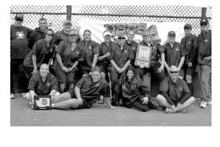 The Valley Merchants adult women’s slow-pitch softball team assembles following the state championship game they recently won in Federal Way. Team members include