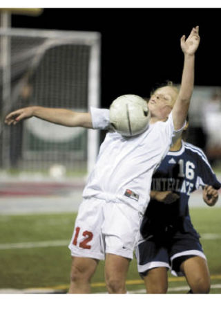 Mount Si High School’s Laura Barnes plays the ball during a contest Monday