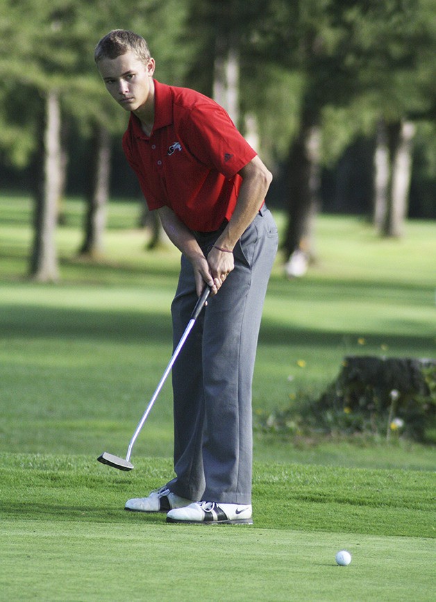 Mount Si golfer Jimmy Jacobson putts on hole four at home last Wednesday