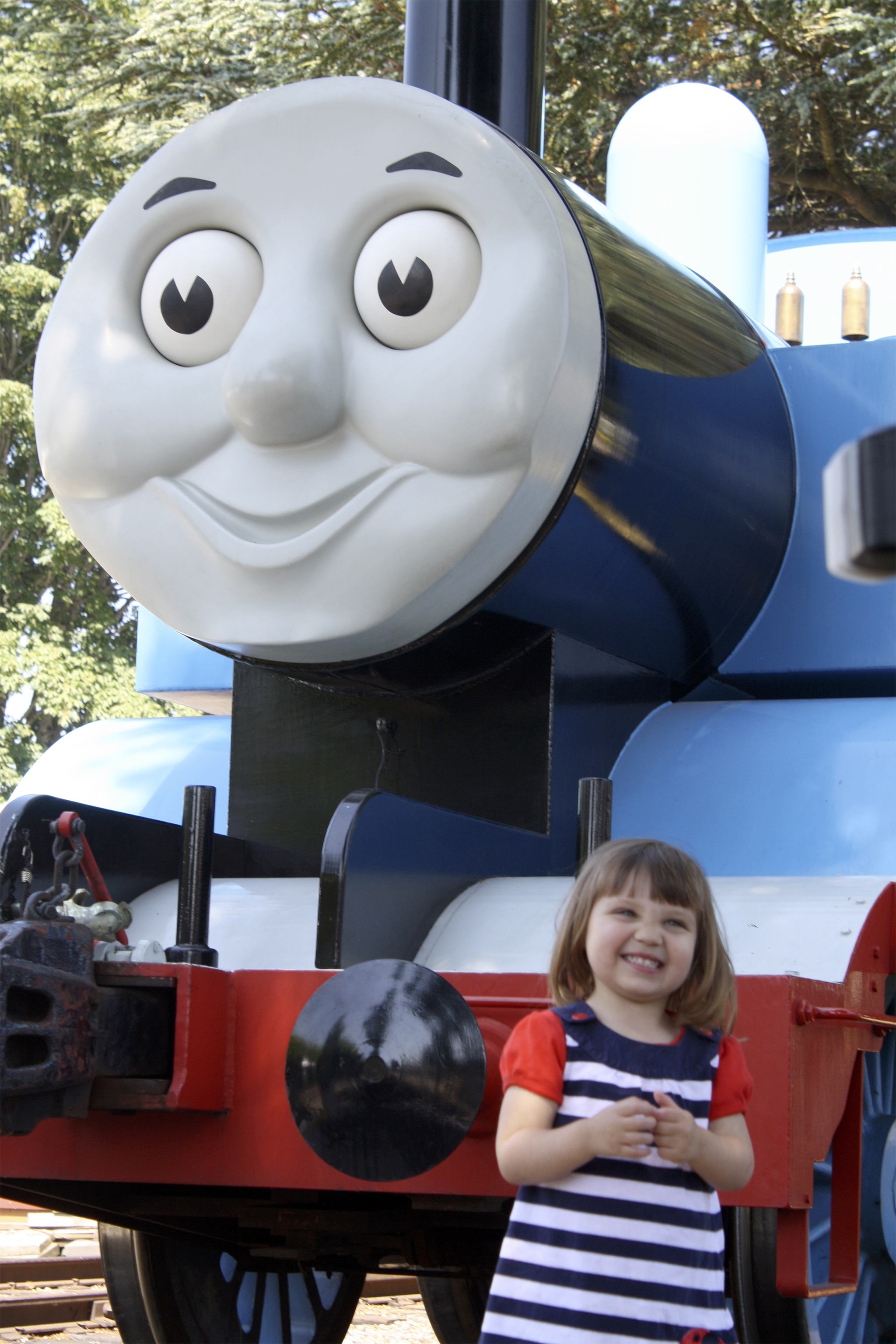 Thomas the Tank Engine poses for a photo with a young fan.File Photo