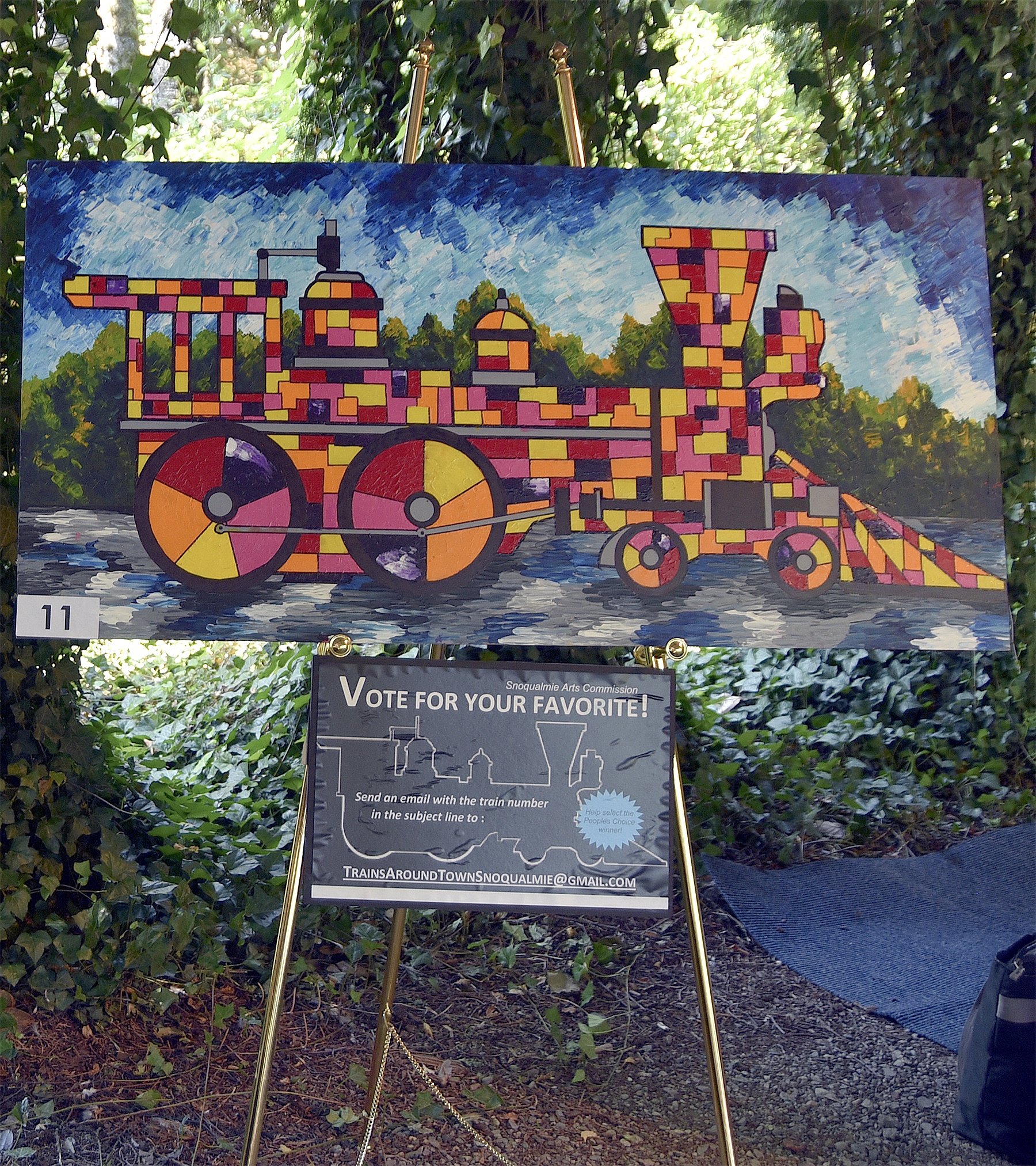 Trains Around Town entries in the Snoqualmie Arts Commission competition were on display during Arts in the Park at Railroad Days.Carol Ladwig/Staff Photo