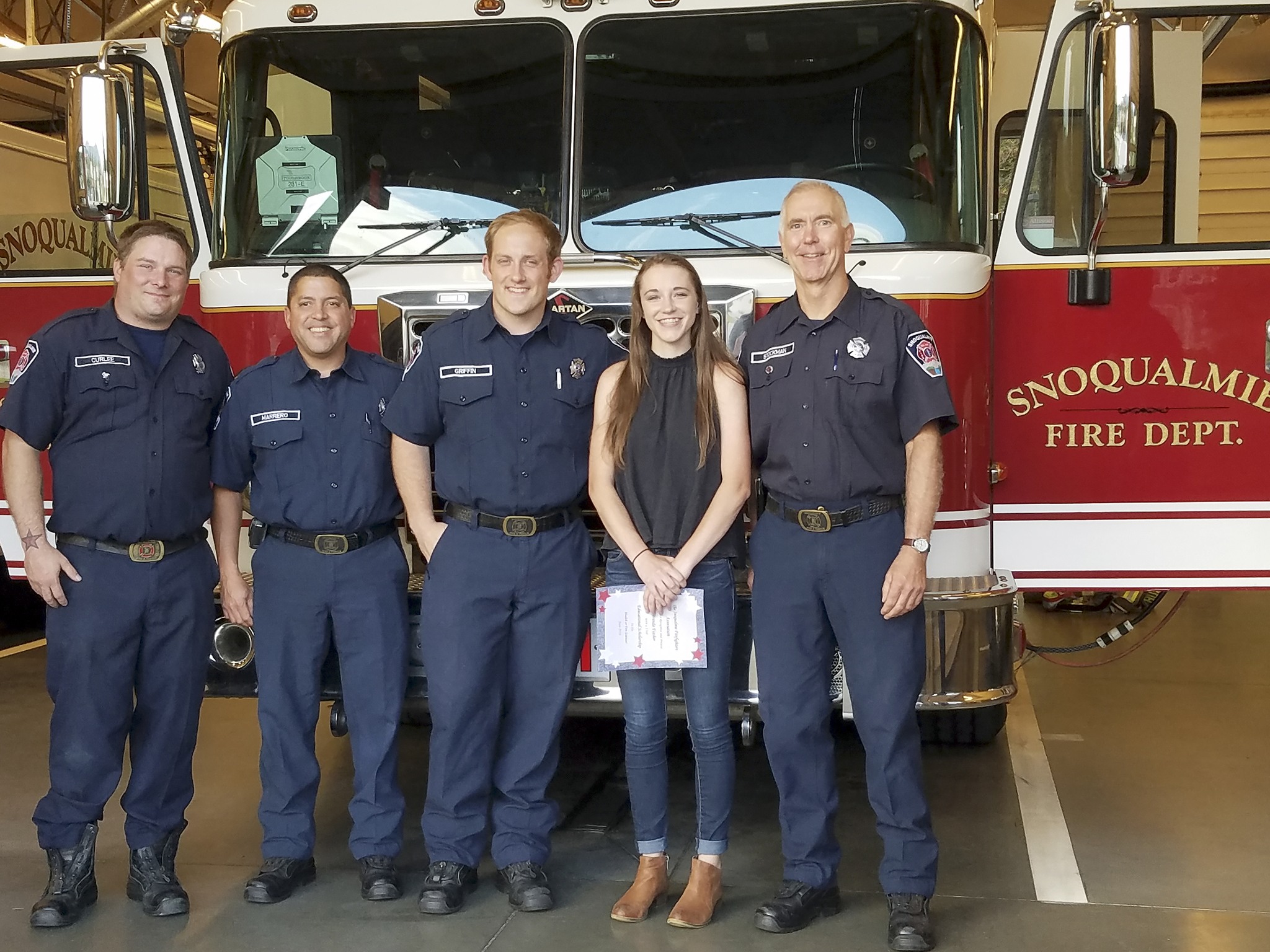 Courtesy PhotoSnoqualmie Firefighters presented 2016 Mount Si High School graduate Miranda Fischer with a $500 scholarship. Pictured from left are volunteer firefighters Jesse Curlee