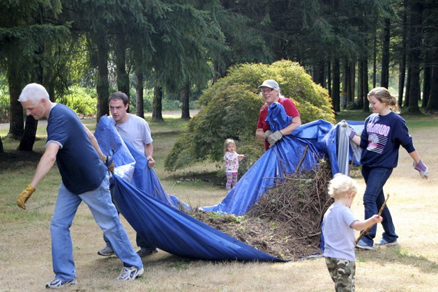 Day of Service volunteers from LDS church clean up Carnation’s Loutsis Park