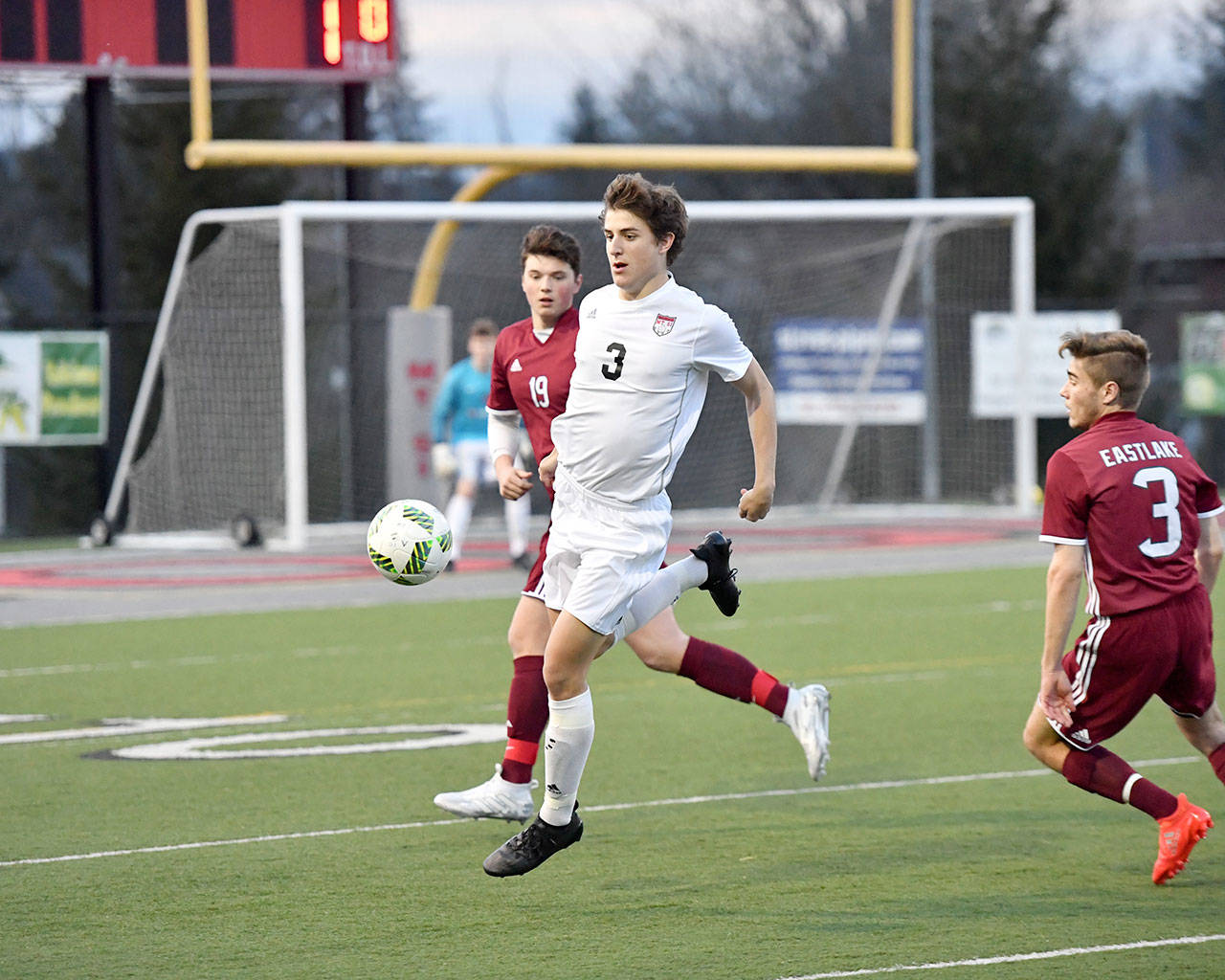 Reed Paradissis gets possession of the ball right at the beginning of the game. (Photo courtesy of Calder Productions)