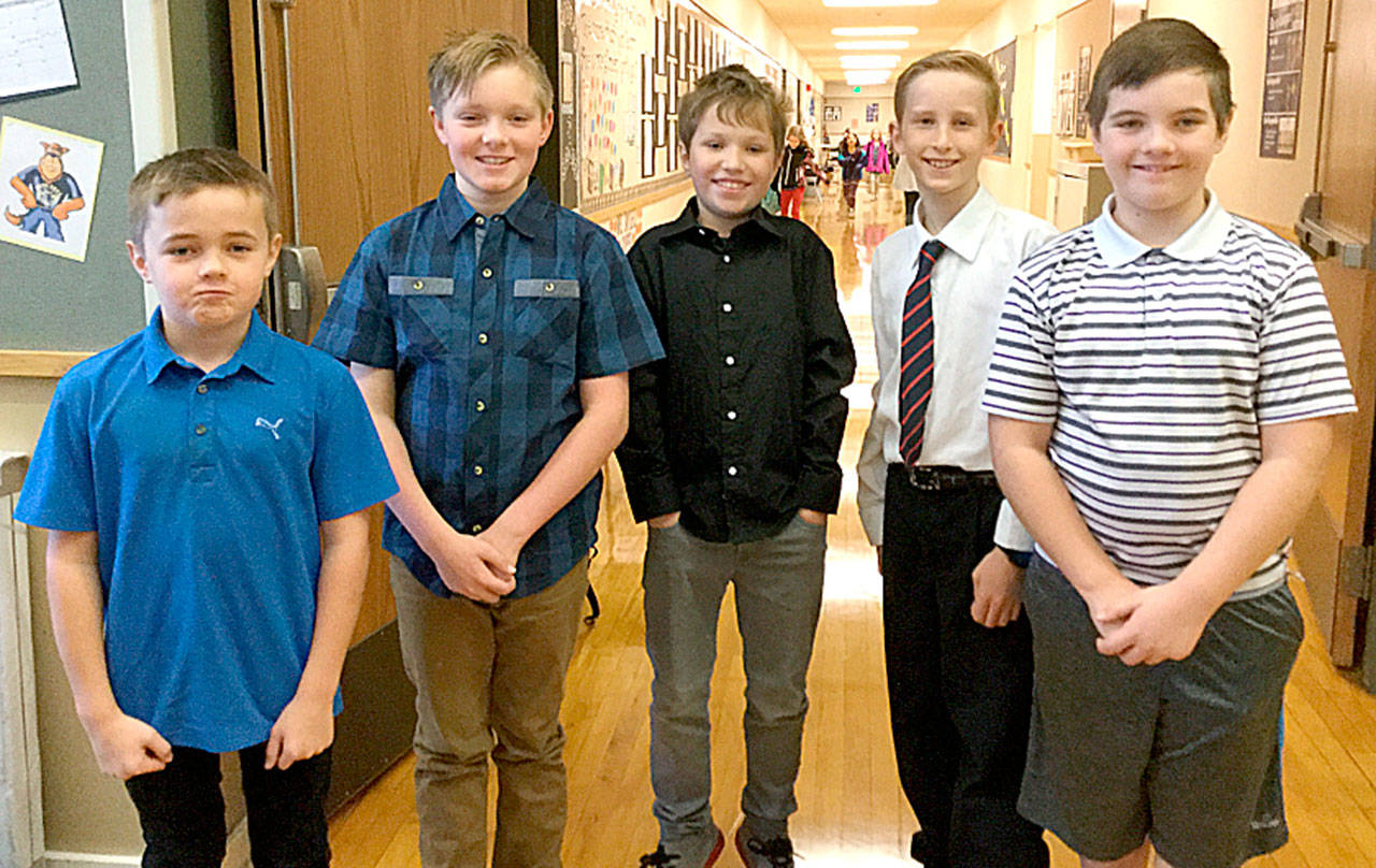 Students await the arrival of their guests at a special veterans reception at Snoqualmie Elementary School Nov. 9. All of the students in Mrs. Cuddihy’s fifth grade class played a role in making the school’s Veterans’ Day assembly happen. (Courtesy Photo)