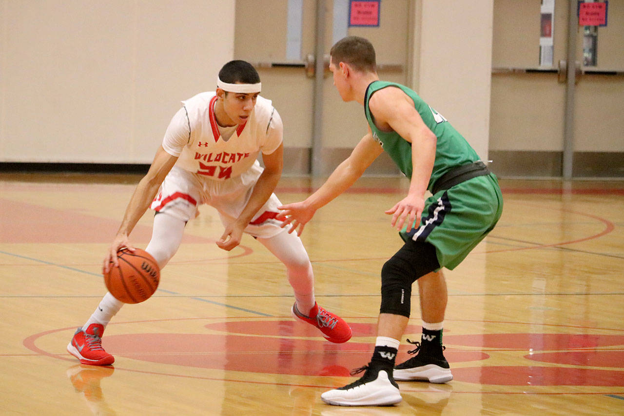 Bijon Sidhu looks for a way around his opponent form Woodinville. (Evan Pappas/Staff Photo)