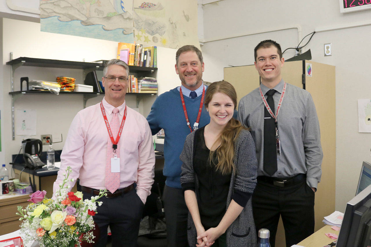 Mount Si High School history teacher Jennifer Holloway is one of four winners of the Educator of the Year award. From left: Mount Si Associate Principal Vernie Newell, Mount Si Principal John Belcher, Jennifer Holloway, and Mount Si Assistant Principal Jerry Maher. (Evan Pappas/Staff Photo)