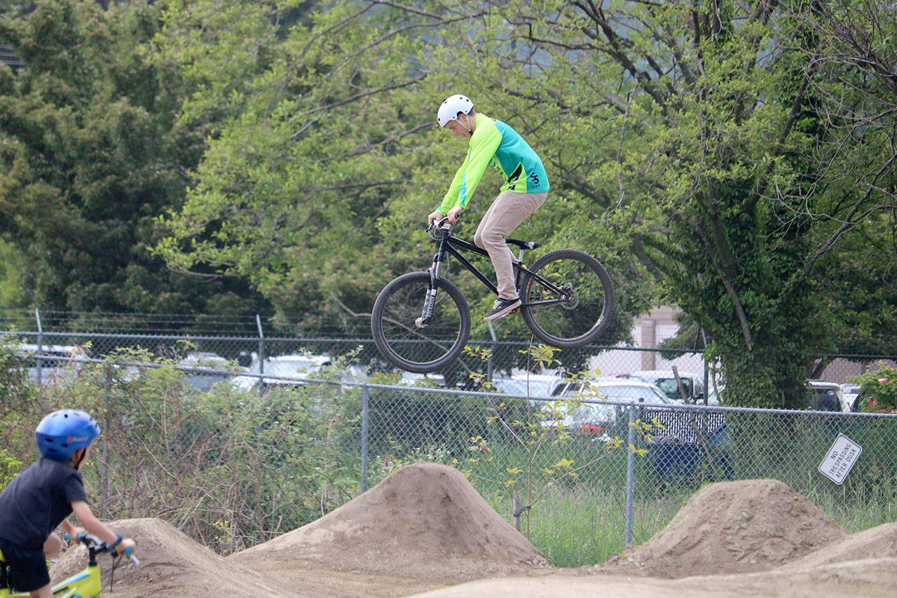 A young biker makes a big jump at the all new park. Evan Pappas/Staff Photo