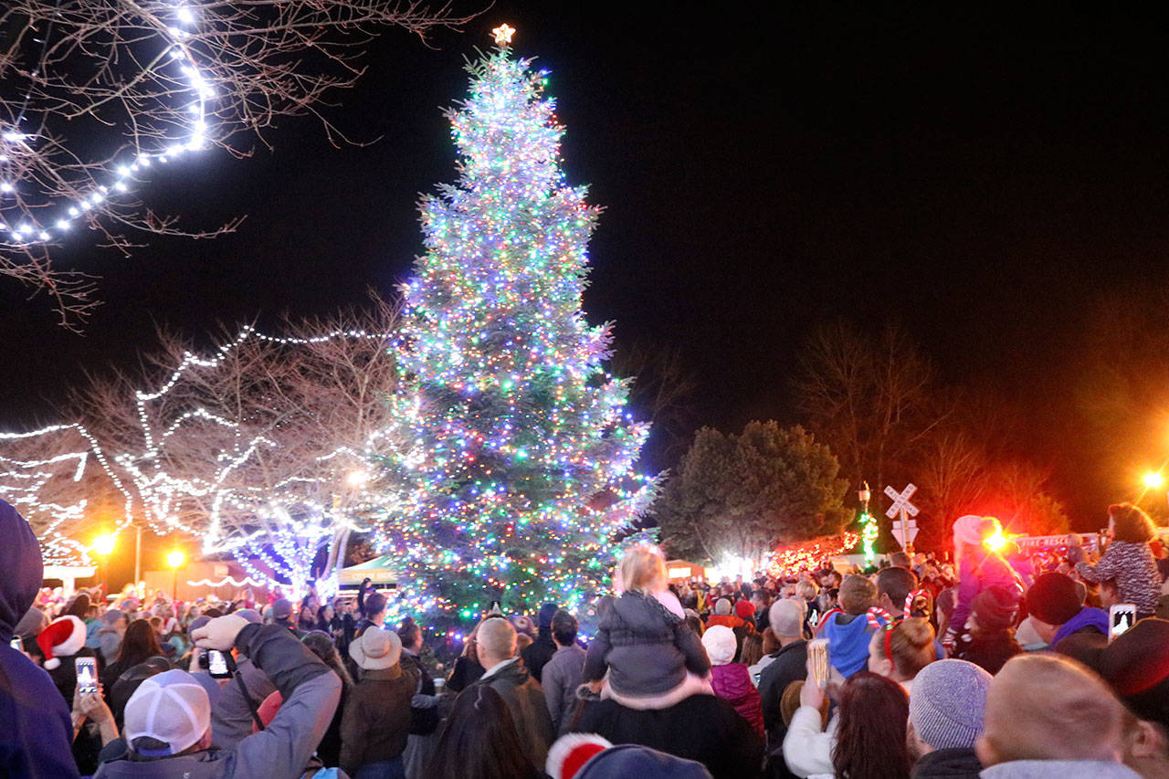 Hundreds of Snoqualmie citizens gather on Railroad Avenue for the annual tree lighting. Evan Pappas/Staff Photo