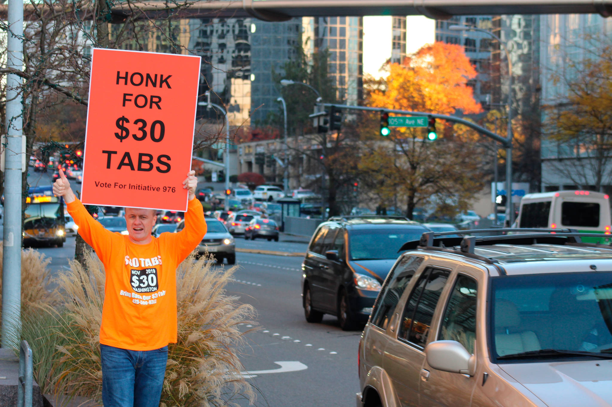 Political activist Tim Eyman rallies support for Initiative 976 on Tuesday afternoon at the corner of NE 8th Street and Bellevue Way NE in Bellevue. Photos by Aaron Kunkler/Sound Publishing