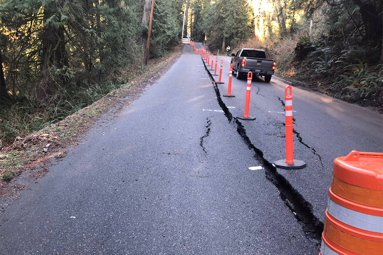 Landslide creates crack in Fall City road, allowing for a one lane entry and exit. Courtesy of King County Road Services