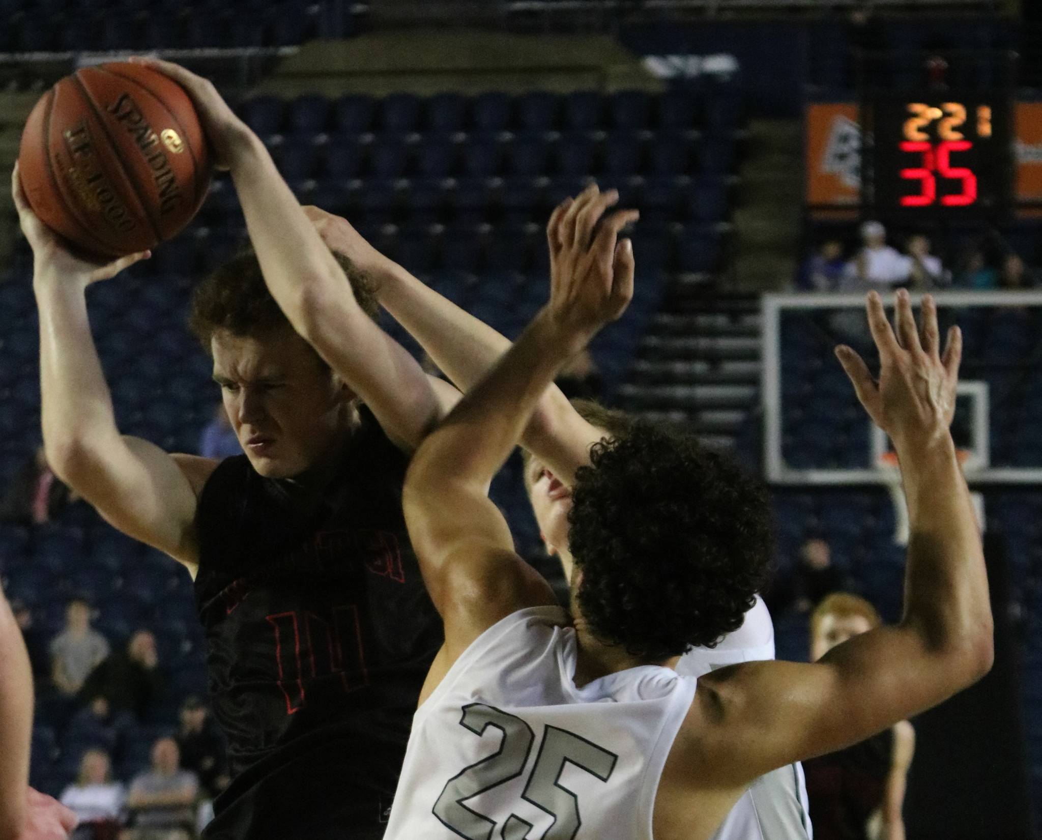 Mount Si’s Jack Williams snags a rebound against Glacier Peak in the 4A state semifinals on Friday at the Tacoma Dome. Andy Nystrom/ staff photo