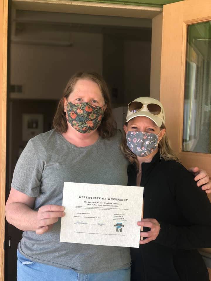 Photo courtesy of Jennifer Kirk
Operations Manager Trissa Dexheimer (left) and Executive Director Jennifer Kirk, of the Snoqualmie Valley Shelter Services, are at the American Legion Post Building, the site of their new 24/7 homeless shelter.