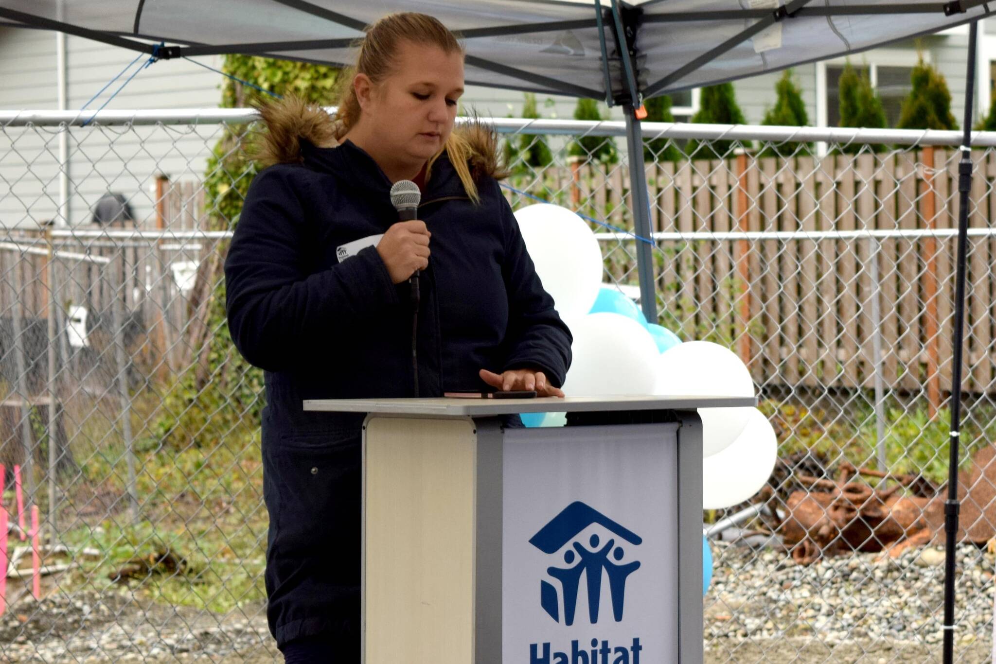 Nicole Evans-Stanley, a Habitat for Humanity homeowner, gives a speech at the Habitat groundbreaking Sept. 28 in North Bend. Photo by Conor Wilson/Valley Record