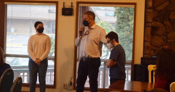 MSHS Principal John Belcher, center, talks about senior students Alie Hall (left) and Zachary Miller, who were both named Student of the Quarter by the Snoqualmie Valley Rotary Club. Photo Conor Wilson/Valley Record