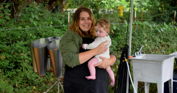 Conor Wilson / Valley Record 
Lulu Redder, owner of Feral Woman Farms in North Bend, and her daughter Rosie.