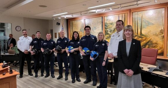 The City of Snoqualmie welcomes six new volunteer firefighters to its department. From left: Snoqualmie Fire Chief Correira, David Hazelton, Kyle Liston, Alex Wolfe, Katie Anthony, Nicko Chaves, Mary Beinner, Snoqualmie Fire Deputy Chief Mike Bailey, Mayor Katherine Ross. Photo Courtesy of the City of Snoqualmie.